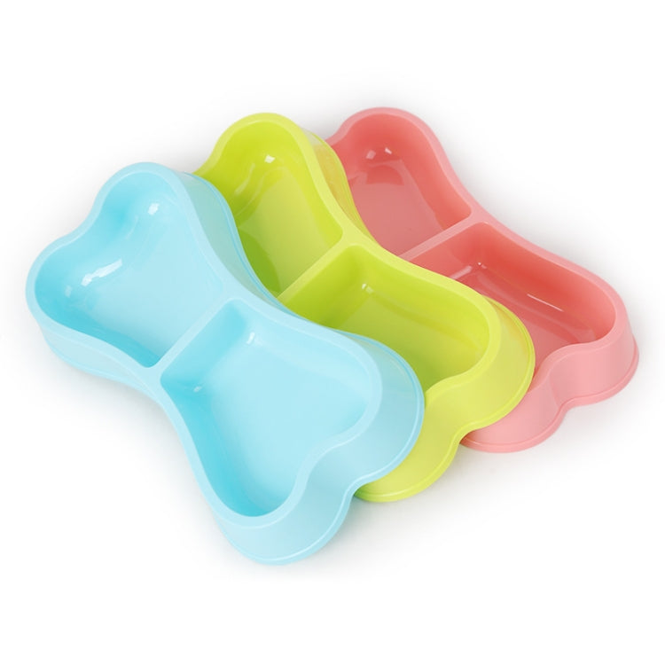 Assorted-color bone-shaped double dog bowls in plastic, showing three sets with two compartments