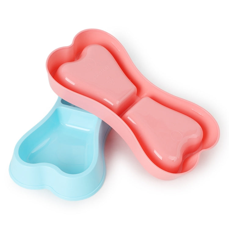 Pink and sky blue bone-shaped double dog bowls in plastic, each with two compartments