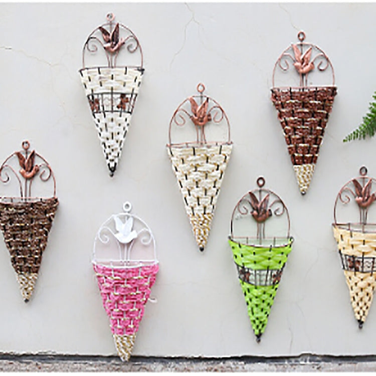 Multiple wall-hanging rattan vase baskets with bird toppers, woven cone planters in assorted colors