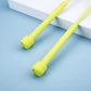 Yellow rubber skipping rope with pen-shaped handles and end stoppers