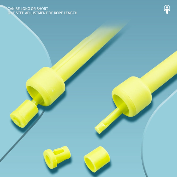 Yellow rubber skipping rope with pen-shaped grips and adjustable end pieces