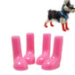 4-piece pink waterproof dog rain boots with non-slip tread, shown as a set