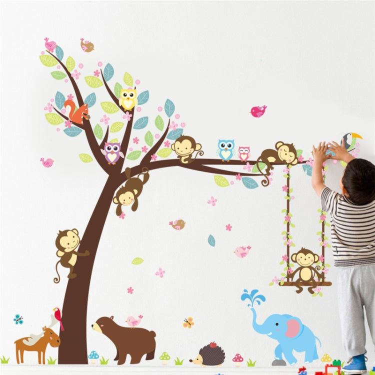 Children's wall sticker mural featuring monkey tree, owls, elephant, and flowered vines