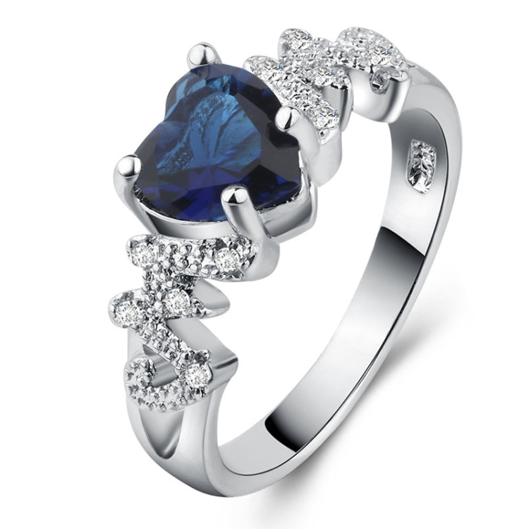 925 sterling silver heart ring with dark blue gemstone and sparkling pave accents