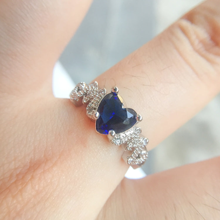 925 sterling silver ring with blue heart-shaped stone and diamond accents