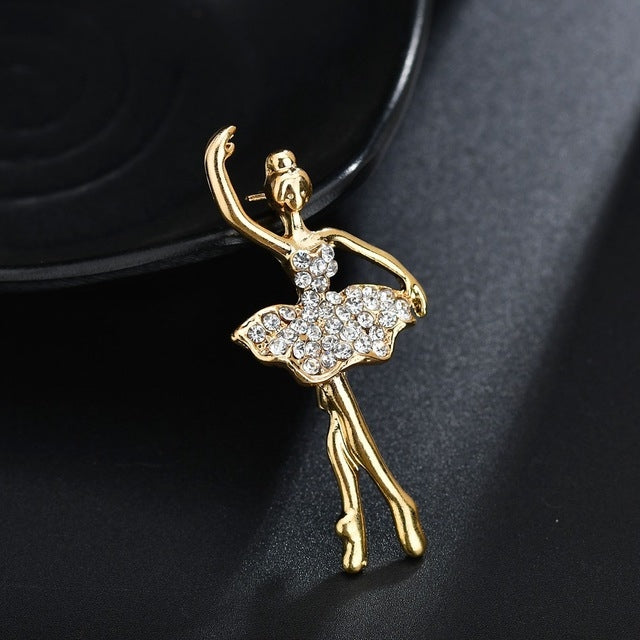 Gold-tone ballet dancer crystal brooch with tutu skirt and dangling legs