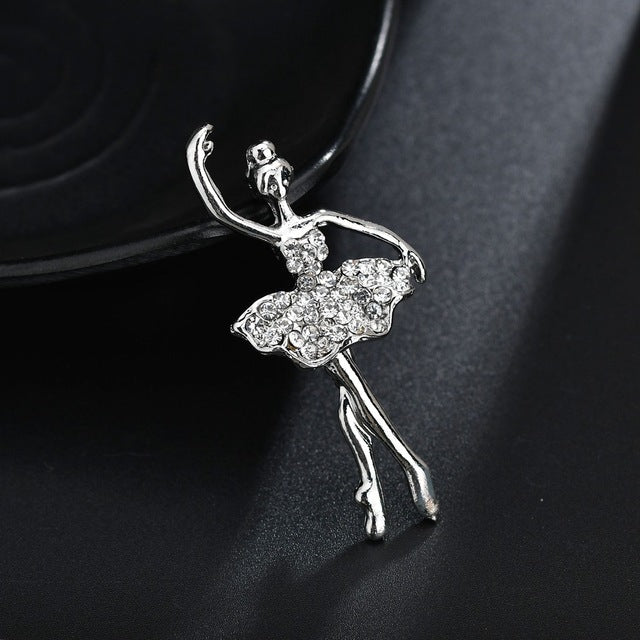 Silver-tone ballet dancer crystal brooch with tutu skirt, curved pose and legs