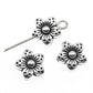Tibetan-style silver flower spacer charms with detailed petals, round center, and metal loop