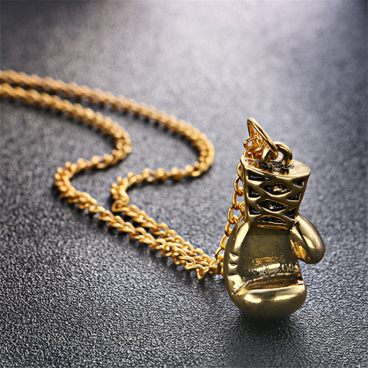 Gold boxing glove pendant necklace, textured glove detail on chain