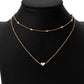 Gold multi-layer heart clavicle necklace with bead accents and heart pendants