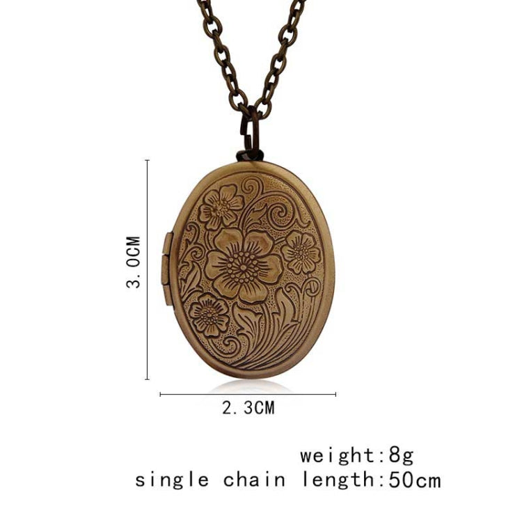 Antique bronze oval locket necklace with engraved floral, 2.3 cm x 3.0 cm