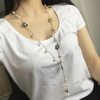 Long pearl bead necklace with five-petal flower charms and pearl drop