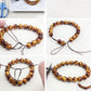 Elastic cord threaded through brown bead bracelet, with tied loose ends