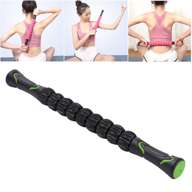 Black and green segmented massage roller stick for muscle soreness relief.
