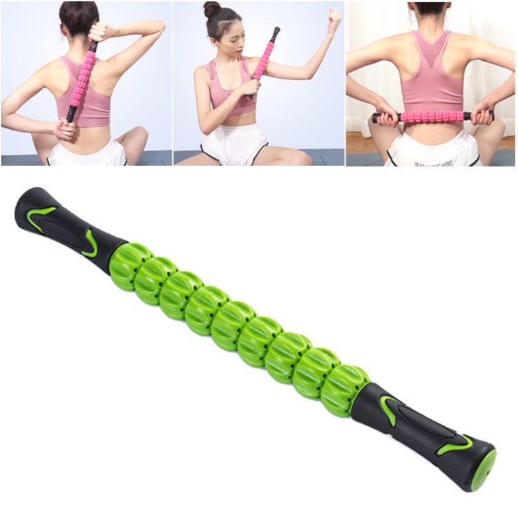 Green and black segmented massage roller stick with cushioned end caps.