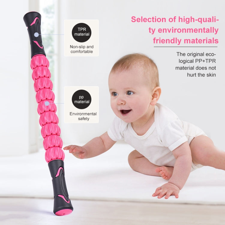Pink segmented massage roller stick with textured grip ends.