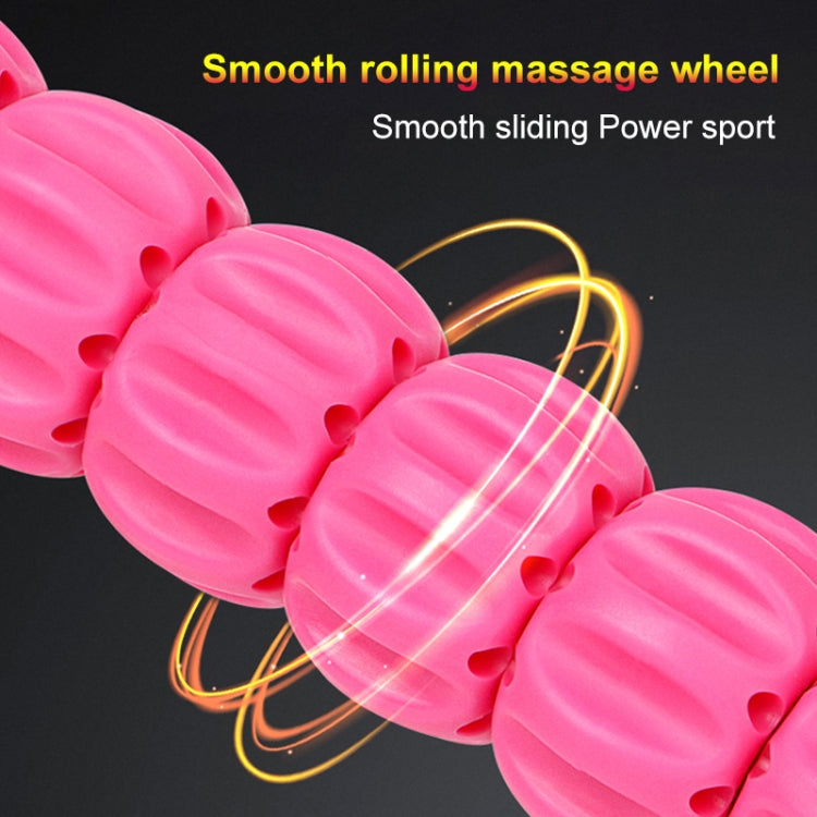 Pink textured massage roller wheel with raised ridges