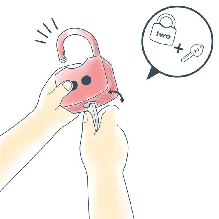 Children's lock and key learning toy set with a hand holding a pink lock and key