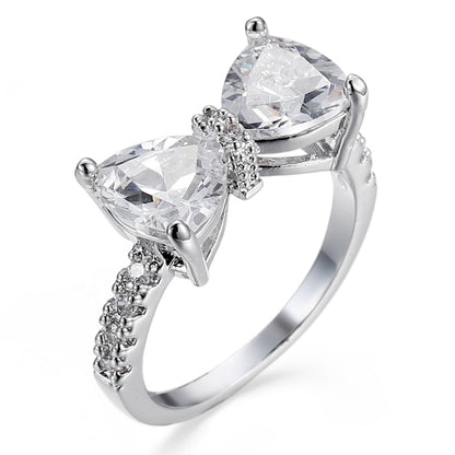 Silver bowknot zircon ring with three clear marquise stones and prong settings