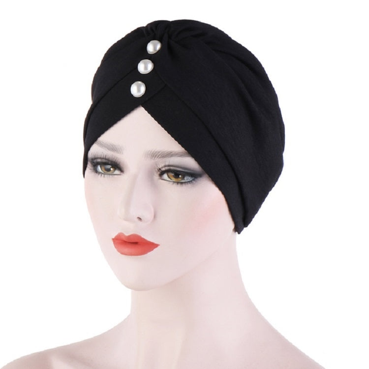 Women’s black hooded turban cap with three pearl accents at top front