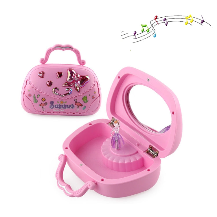 Pink open music jewelry box with ballerina figurine and ring-like side latch