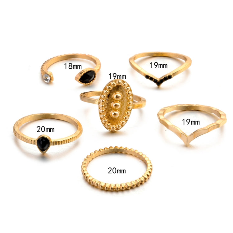 Gold-tone six-piece waterdrop ring set with black stones; ring widths 18–20mm shown