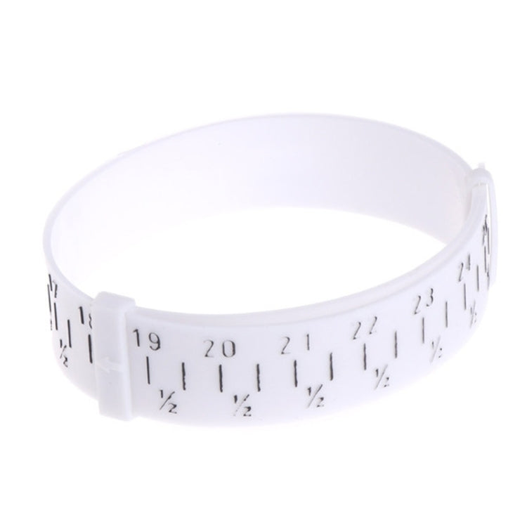 White wrist measuring bracelet gauge with printed size markings and notched clasp