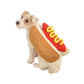 Hot dog style pet costume on a small white dog, red top bun with yellow zigzag