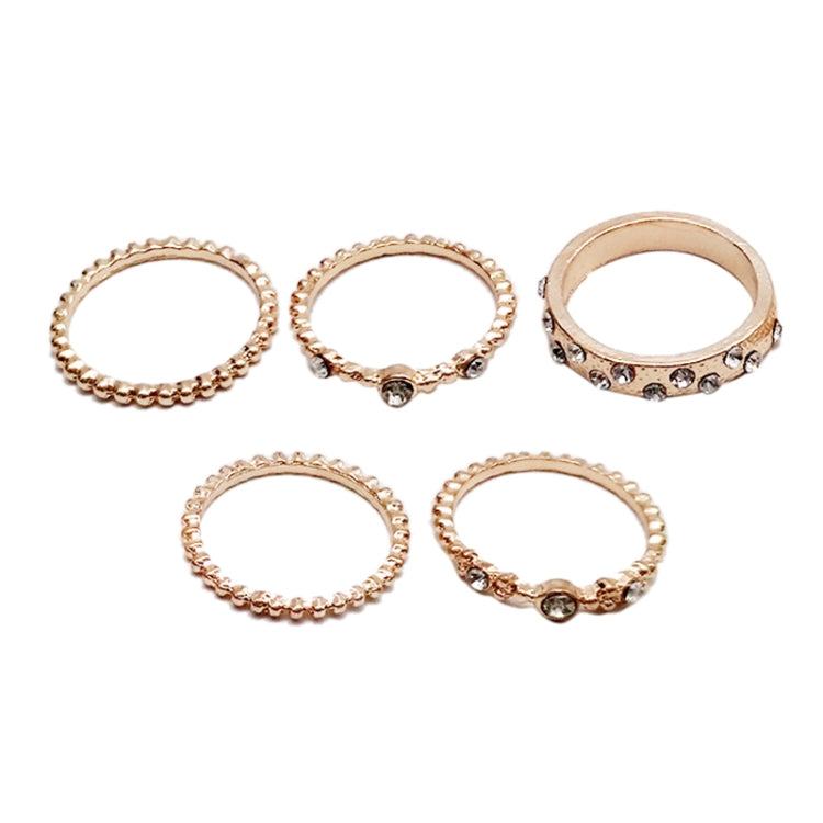 Rose gold rhinestone ring set, five oval bands with scalloped trim and small center stones