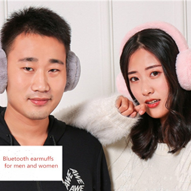 Pink plush Bluetooth earmuffs worn over ears