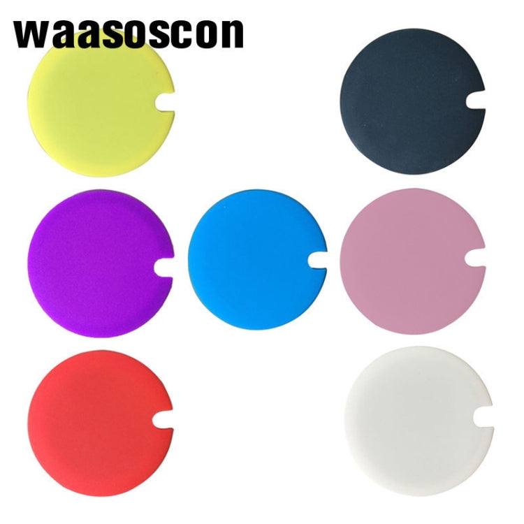Set of silicone cup lids in multiple colors with tab openings