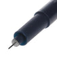 Fine engraving needle tip on dark pen body with blue inner sleeve