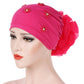 Women’s beaded flower turban hat in pink with ruched back flower detail
