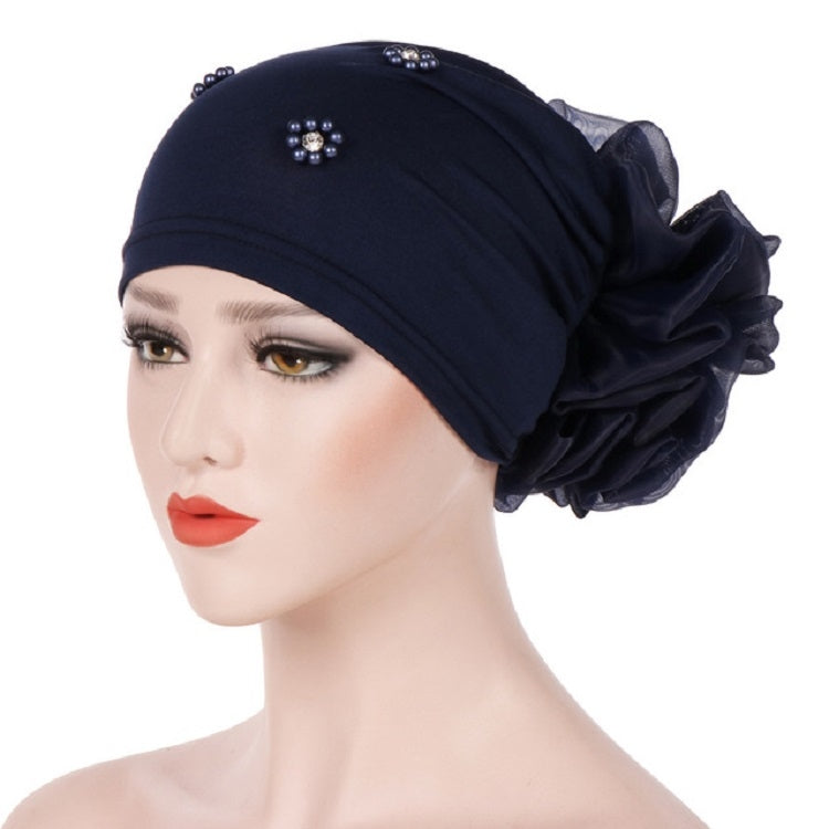 Women’s beaded flower turban hat in dark navy with ruched back flower detail