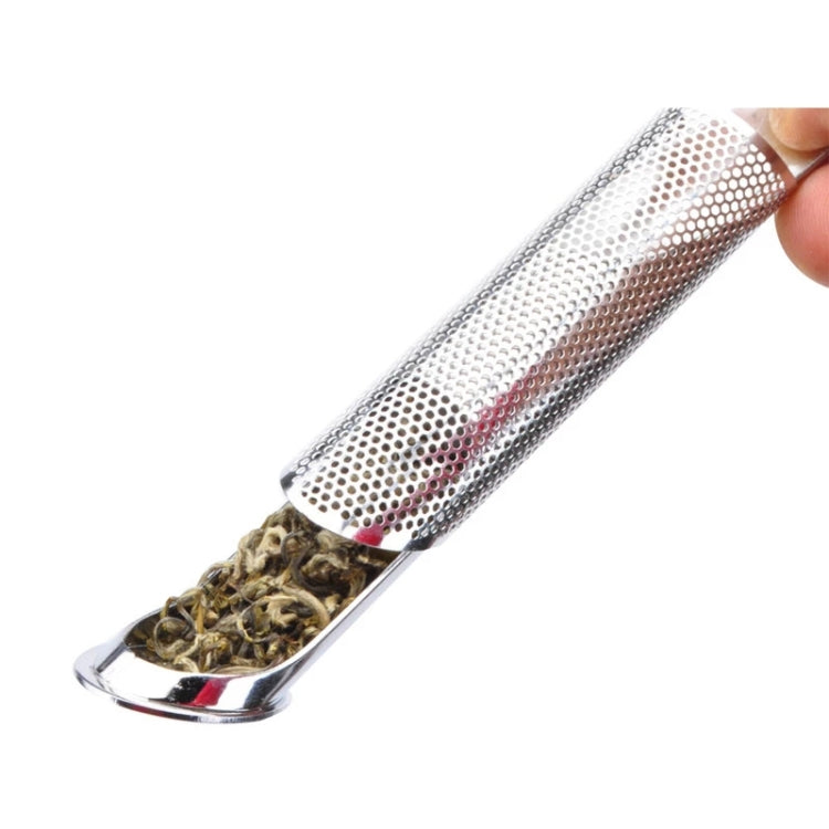 Perforated stainless steel tea infuser pipe holding dry tea leaves inside