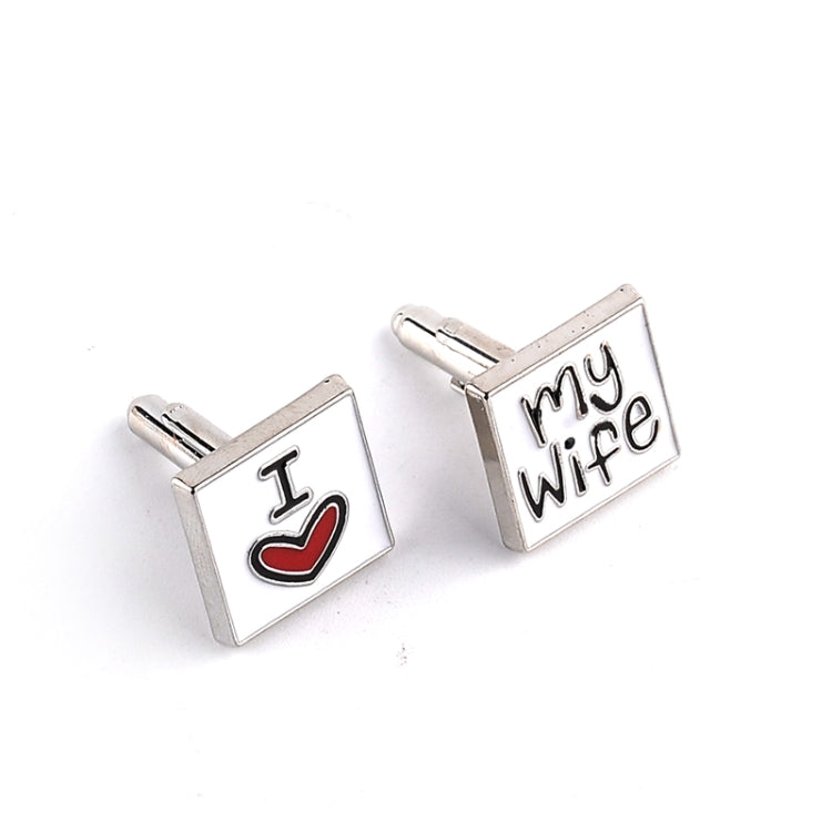 Pair of silver-tone men’s cuff links: “I” with red heart and “My Wife”