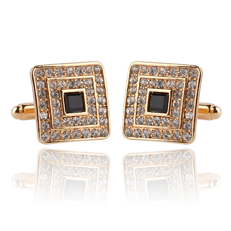 Gold-tone square cufflinks pair with rhinestone frame and black square center