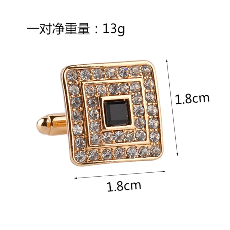 Gold-tone square cufflinks with black center and rhinestone border, front close-up