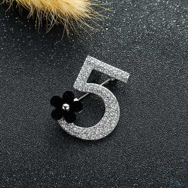 Rhinestone number 5 brooch with black flower detail, silver-tone metal pin