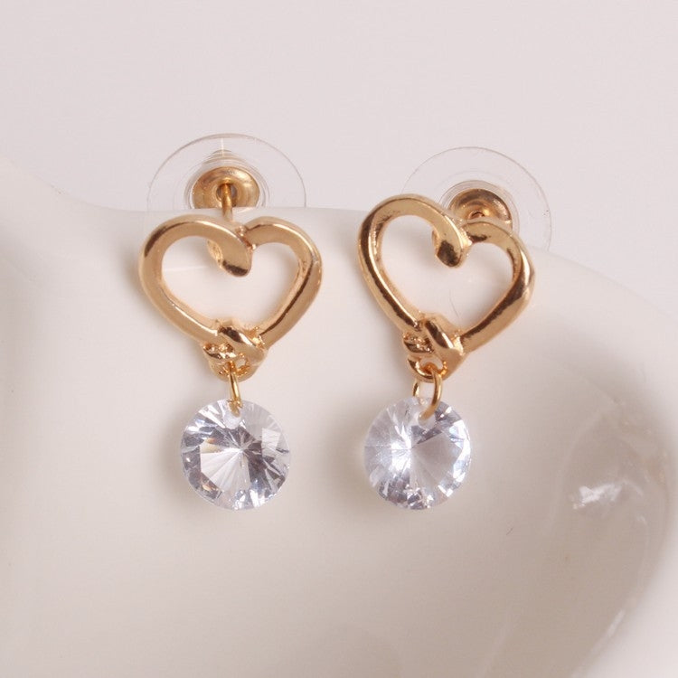 Gold-tone heart drop earrings with round clear crystal pendants, 2 pairs