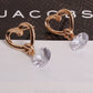Gold heart hoop earrings with dangling round clear crystals