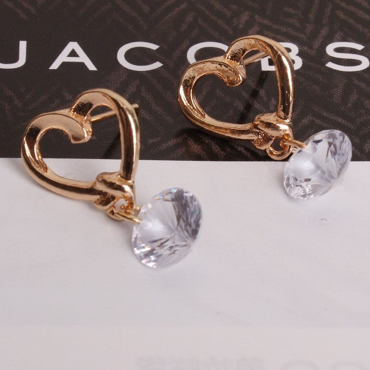 Gold heart hoop earrings with dangling round clear crystals