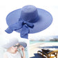 Foldable wide-brim sun hat, blue straw with bow ribbon and wide floppy brim
