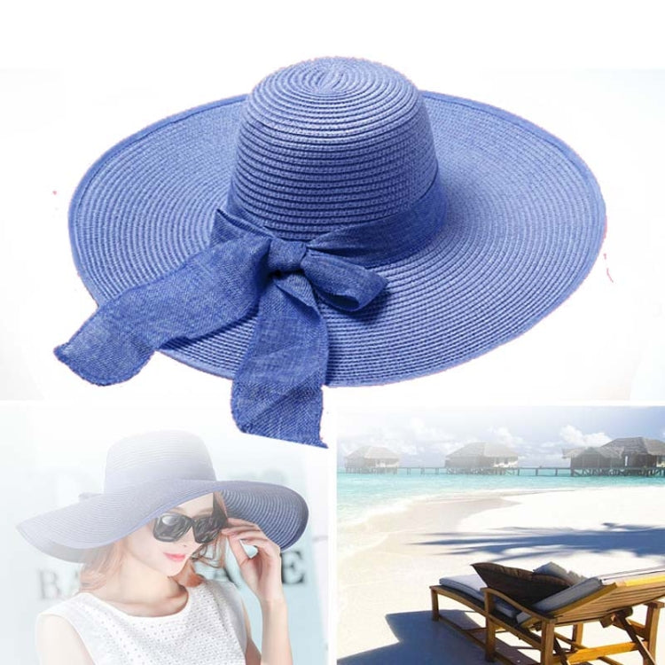 Foldable wide-brim sun hat, blue straw with bow ribbon and wide floppy brim