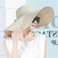 Foldable wide-brim sun hat, beige straw with wide floppy brim and soft crown