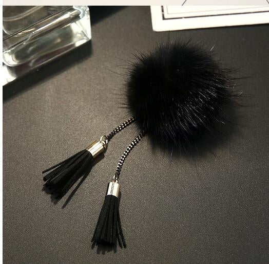 Black fur pom chain tassel brooch with black tassels and silver bead chain