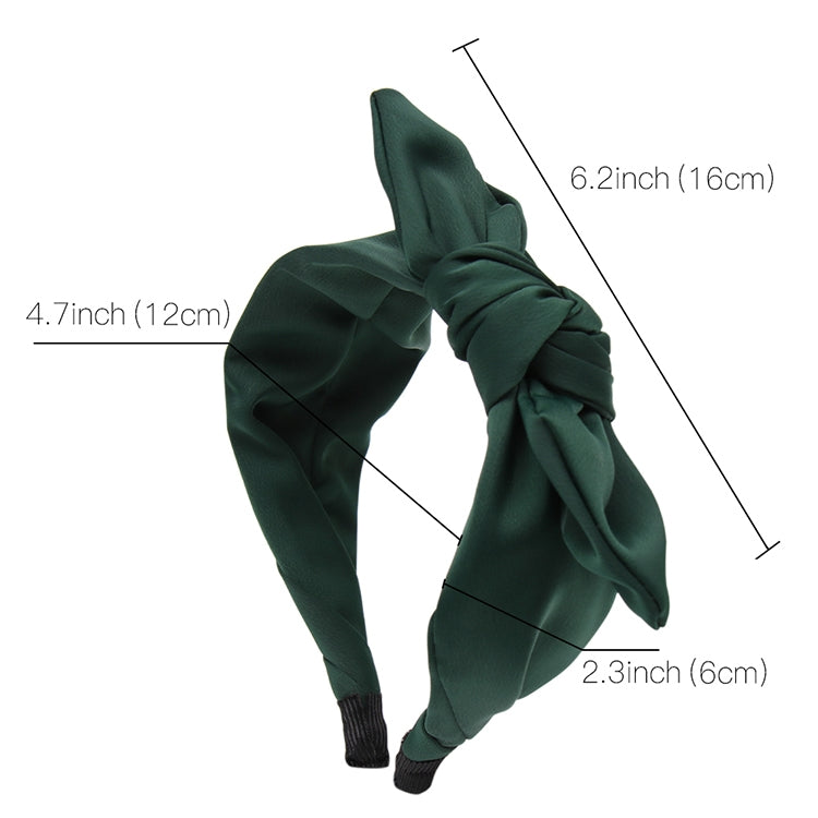 Green fabric rabbit-ear bow headband with knotted center, product size diagram