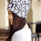 Women’s letter-print turban cap, beige with black letters, side profile