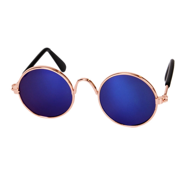 Round pet sunglasses with dark blue reflective lenses, rose-gold frame, black stems