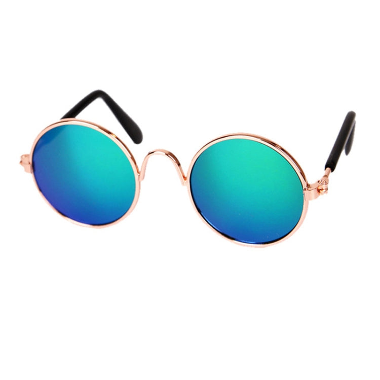 Round pet sunglasses with teal reflective lenses, rose-gold frame, black stems